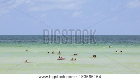 People Enjoy Swimming In South Beach In Miami