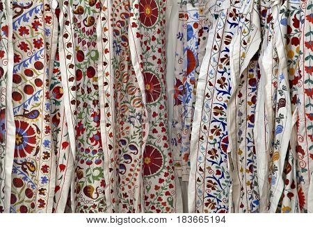 Traditional uzbek suzani embroidery fabrics at oriental bazaar, Bukhara, Uzbekistan
