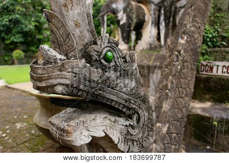 Dragon head stone statue in Chiang Man temple, Chiang Mai