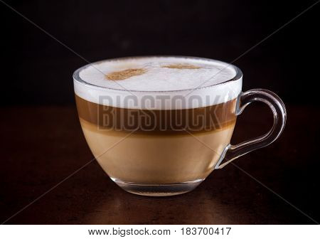 Coffee Latte Macchiato On A Black Background