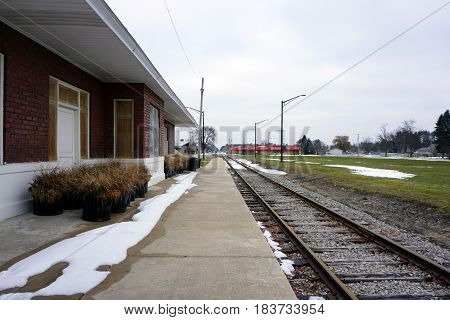 KALKASKA, MICHIGAN / UNITED STATES - NOVEMBER 27, 2016: The loading platform of the historic Train Depot is now the back of the Kalkaska Historical Museum in downtown Kalkaska.