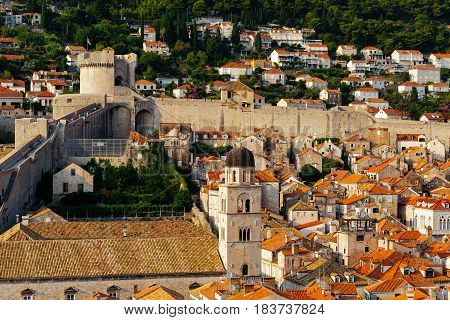 Protective city wall, Minceta tower and Franciscan Monastery and Museum in Dubrovnik, Croatia.