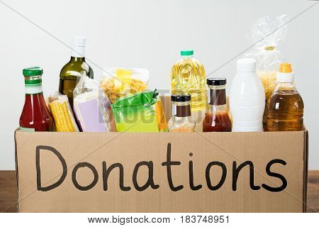 Close-up Of A Donation Box With Various Food Items In It
