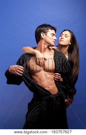 The naughty couple is about to kiss.
