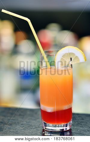 glass of cocktail on bar