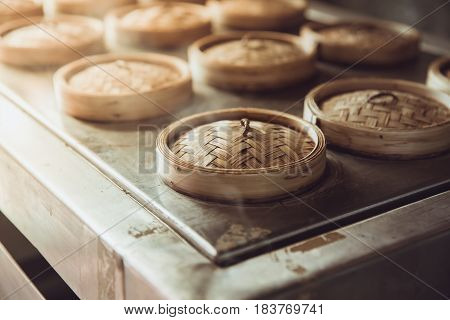 Chinese Hot Steam Cooking Food Yumcha Or Dim Sum In Bamboo Steamer Basket Vintage Color Tone