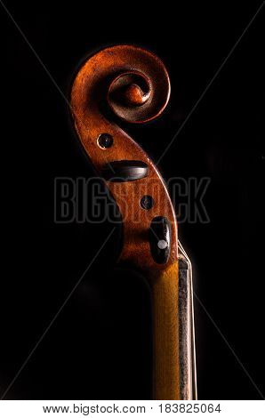 Side View of a Violin Pegbox, Isolated on Black