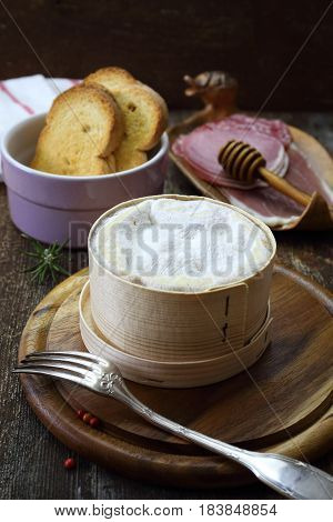 French Vacherin Mont d'Or cheese cold cuts for cheese fondue