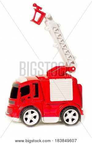 car toy red fire truck with extendable ladder and basket, copy space