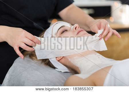 Woman Getting Enzymatic Peeling At Beautician's