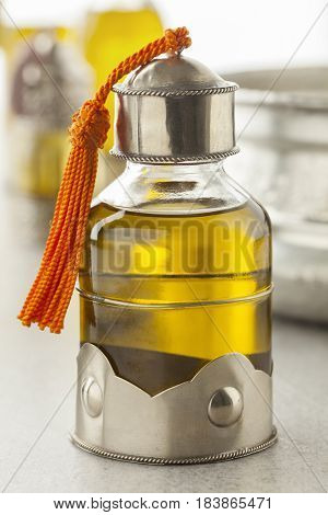 Moroccan bottle with organic cosmetic oil in the hammam