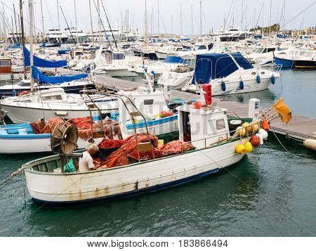 Fisherman System Networks On The Small Boat Moored In The Harbor