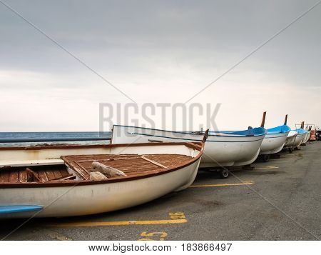 Small Fishing Boats Lying On The Shoreline