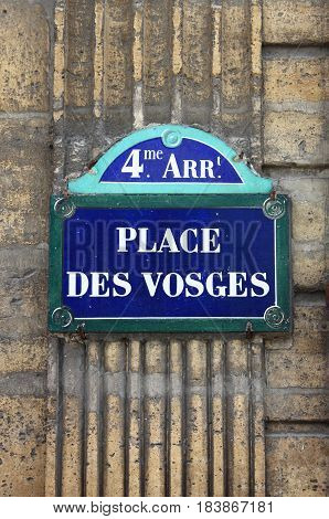 Place des Vosges street sign in Paris, France