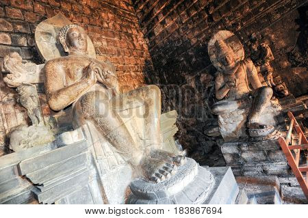Buddha Statues Of Mendut Buddhist Temple In Central Java