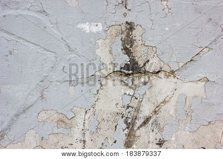 Wheathered Concrete Wall With Great Number Of Cracks