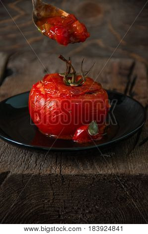 Close Up Suffed Tomatoes Filled With Rice And Ground Beef Baked In Oven.