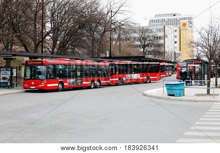Solna Sweden - April 20 2017: City busses the Solna city center public transportation hub.