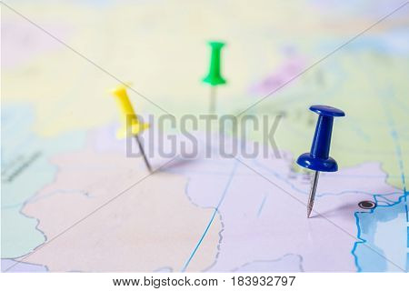 pushpin showing the location of a destination point on a map