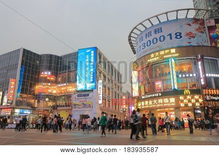GUANGZHOU CHINA - NOVEMBER 12, 2016: Unidentified people visit Shangxiajiu pedestrian street. Shangxiajiu is the first business street in Guangzhou opened in 1997