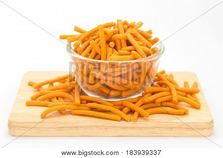 Hard bread creaker on glass bowl on white background