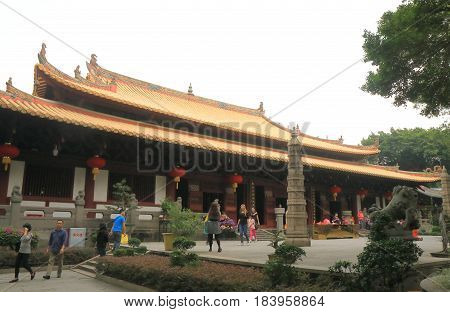 GUANGZHOU CHINA - NOVEMBER 13, 2016: Unidentified people visit Guangxiao Temple. Guangxiao Temple is one of the oldest Buddhist temples in Guangzhou.