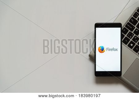 Bratislava, Slovakia, April 28, 2017: Mozilla firefox logo on smartphone screen placed on laptop keyboard. Empty place to write information.