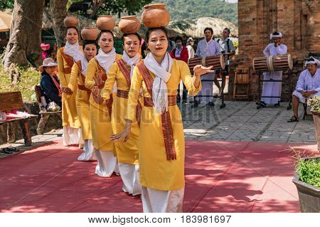 Nha Trang VIETNAM - MARCH 19 2017. Women dance Traditional with clay pots on lunar new year in pagoda Po Nagar. Po Nagar in Nha Trang Vietnam.