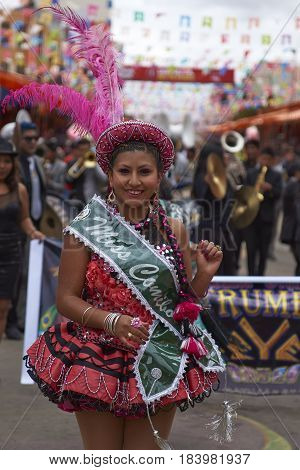 ORURO, BOLIVIA - FEBRUARY 26, 2017: Morenada dance group in colourful outfits parading through the mining city of Oruro on the Altiplano of Bolivia during the annual Oruro Carnival.