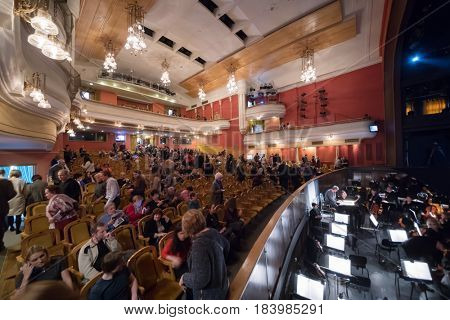 MOSCOW - JAN 25, 2017: People and orchestra pit during intermission of performance in New Opera theater