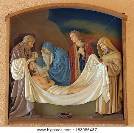 BUDASEVO, CROATIA - NOVEMBER 05: 14th Stations of the Cross, Jesus is laid in the tomb and covered in incense, Church of the Blessed Aloysius Stepinac in Budasevo, Croatia on November 05, 2007