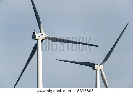 Fairhaven Massachusetts USA - August 22 2012: Pair of wind turbines paused in Fairhaven Massachusetts