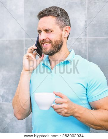 Man Drink Cappuccino Speak Phone Grey Wall Background. Coffee Can Be Endlessly Reimagined Make Somet