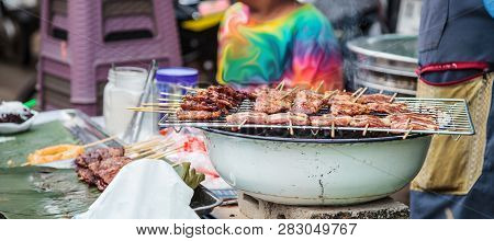 Traditional Street Food Cuisine, Thai Marinated Pork Skewers (moo Ping, Barbecue Pork Skewers), Gril