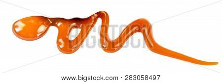 Caramel Sauce Isolated On White Background Close Up