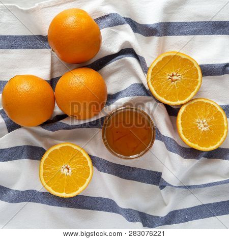 Homemade Orange Marmelade In Glass Jar, View From Above. Flat Lay, Top View, Overhead.