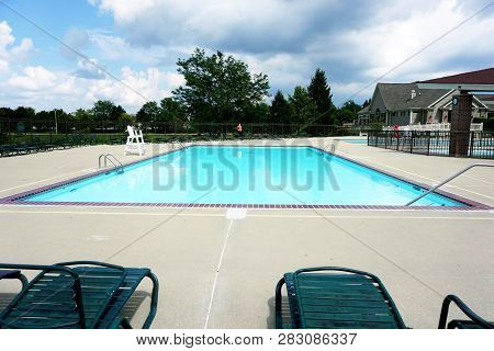 One May Swim In The Wesmere Country Club Swimming Pool, In Joliet, Illinois, During August.