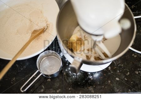 Alternate Version Of Overhead Shot Of Mixing Cookie Batter In A Stand Mixer With Flour In A Bowl And