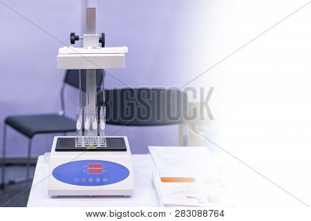 Many Test Tube Setup At Automatic Sample Concentrator Machine Device Has Needles Or Glass Pipette Bl