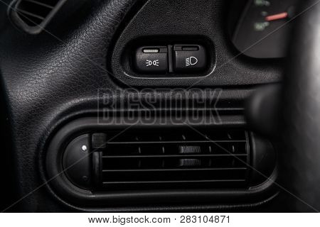 Novosibirsk, Russia - February 08, 2019: Chevrolet Niva, Close-up Of The Headlight Adjustment Button