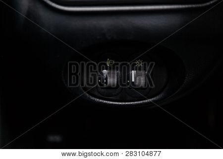 Novosibirsk, Russia - February 08, 2019: Chevrolet Niva, Close-up Of The Headlight Adjustment Button