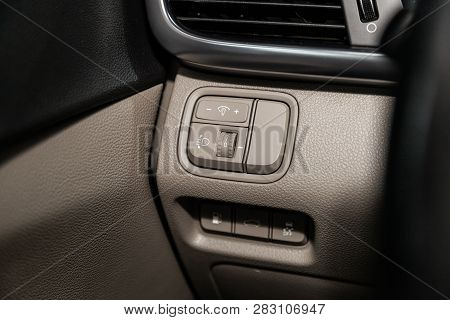 Novosibirsk, Russia - February 08, 2019: Kia Optima, Close-up Of The Headlight Adjustment Buttons. P