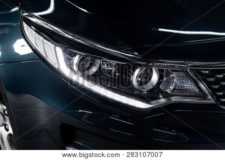 Novosibirsk, Russia - February 08, 2019: Kia Optima,  Close-up Of The Headlights. Photography Of A M