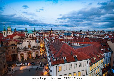 View On The Roofs In Stare Misto. Prague. Sunset