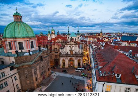 View On The Roofs In Stare Misto. Prague. Sunset