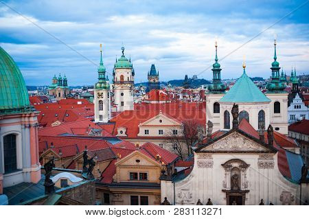 View On The Roofs In Stare Misto. Prague. Sunset