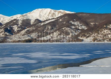 Frozen Dam Of Campotosto On Winter Day
