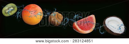 Fruits - Grepfruit, Kiwi, Coconut On An Isolated Black And Green Background