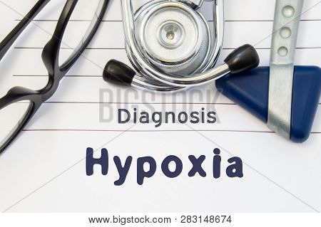 Neurological Diagnosis Of Hypoxia. Neurological Hammer, Stethoscope And Doctors Glasses Lie On Docto