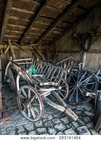 Old shed with farmstead wooden hayrack